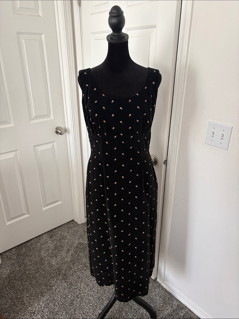 Jo Collin’s Vintage Black Velvet Midi Dress with Embroidered Rosettes.